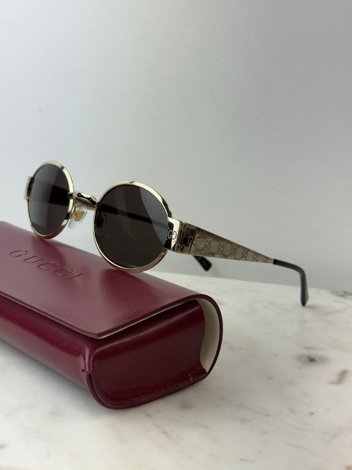 Gafas de sol con montura gruesa en marrón Gucci GG1338SK