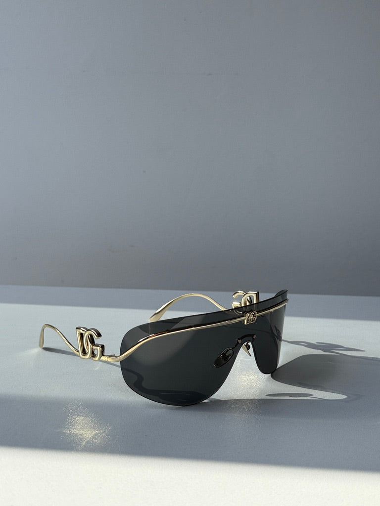 Dolce &amp; Gabbana DG2298B Gafas de sol con escudo negro cristalino 