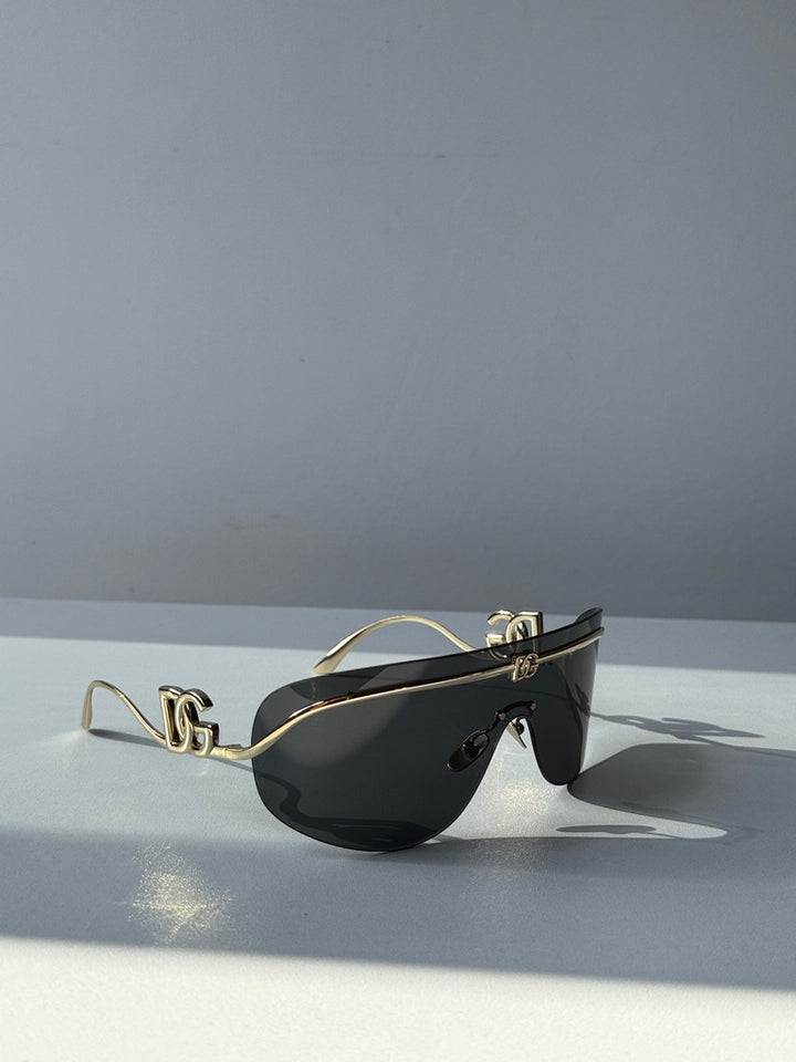 Dolce &amp; Gabbana DG2298B Gafas de sol con escudo negro cristalino 