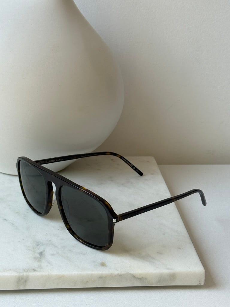 Aviator sunglasses with dark lenses and havana brown frame, three-quarter side view