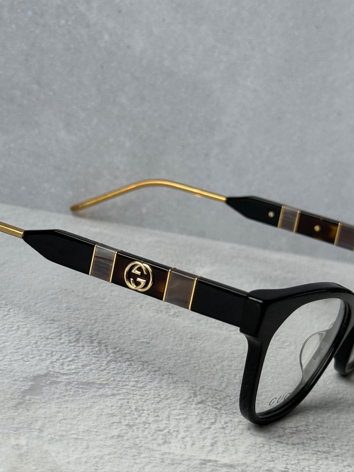 Monturas de anteojos estilo ojo de gato negro Gucci GG0600O