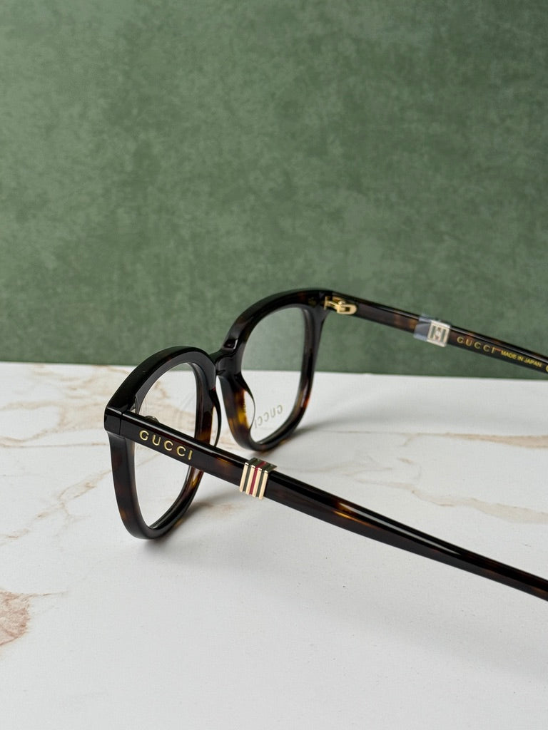 Havana brown square eyeglass frames with Gucci-branded temples, side angle
