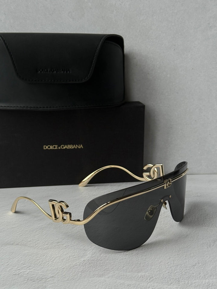 Dolce &amp; Gabbana DG2298B Gafas de sol con escudo negro cristalino 