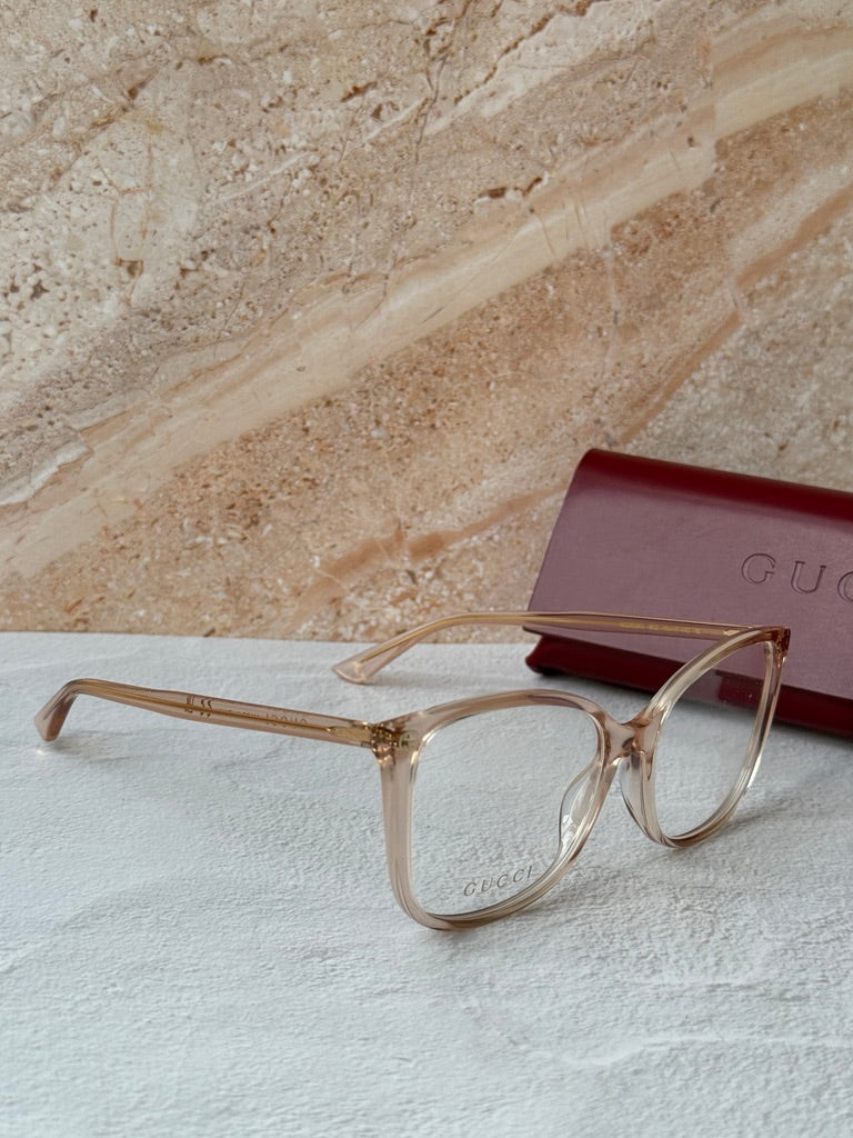 Monturas de anteojos estilo ojo de gato cuadrados desnudos Gucci GG0026O