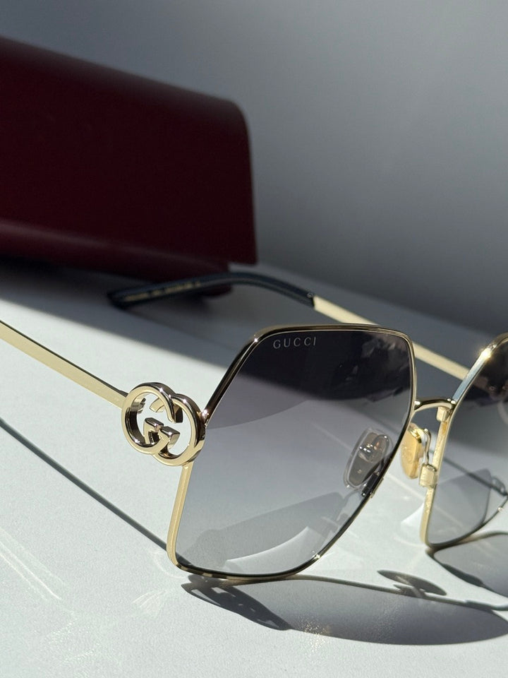 Gafas de sol extragrandes Gucci GG0817S con lentes grises 