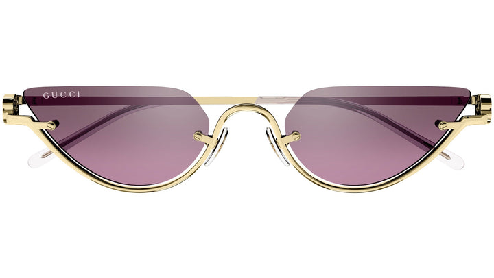 Gucci half-rim sunglasses with gold frame and pink tinted lenses