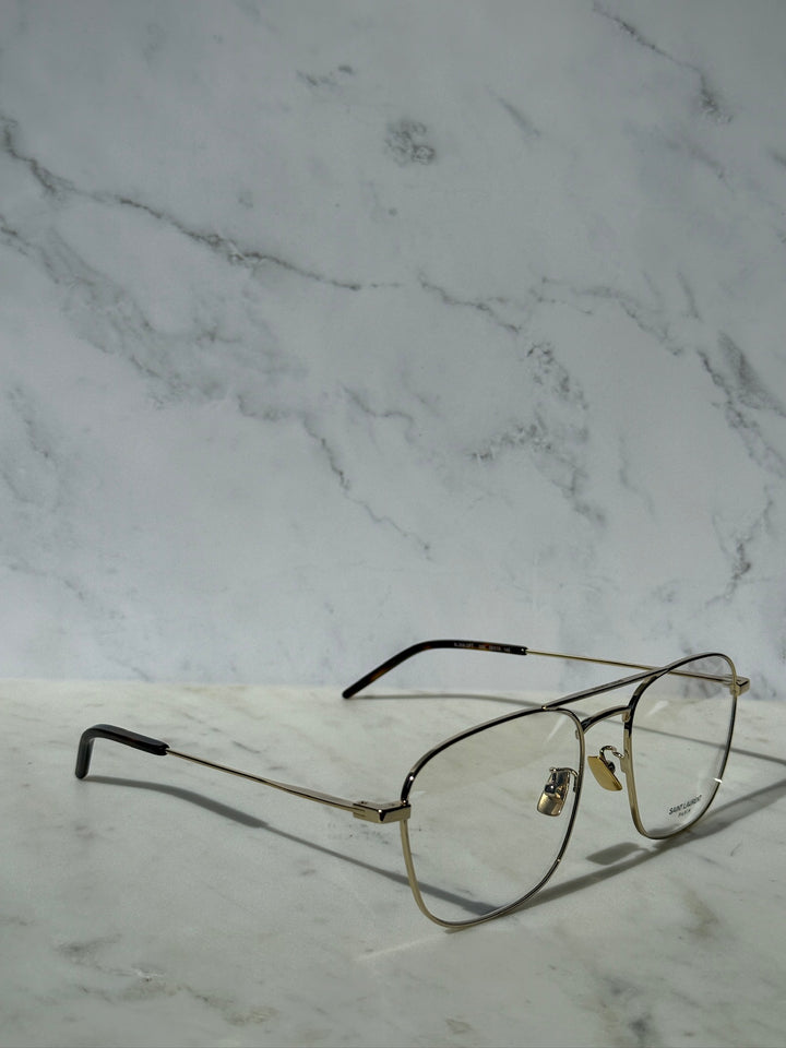 Gold aviator eyeglass frames with clear lenses and slim curved temple tips.