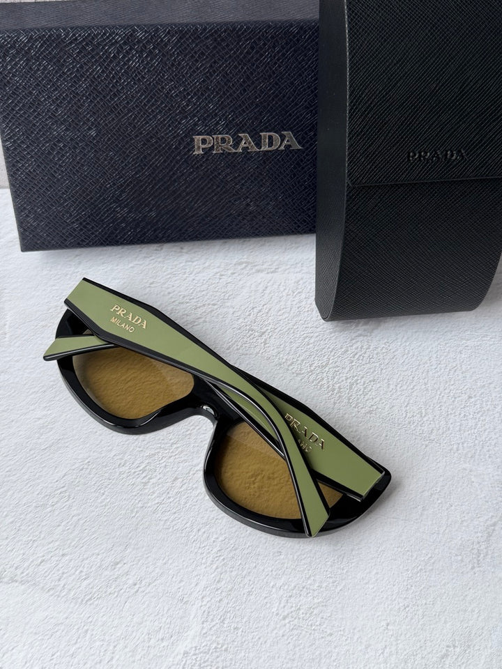 Prada PR D02S Cat Eye Sunglasses in Black Yellow