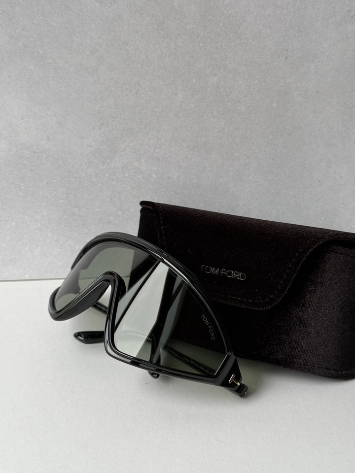 Black sunglasses with dark lenses and glossy frame, with black soft case