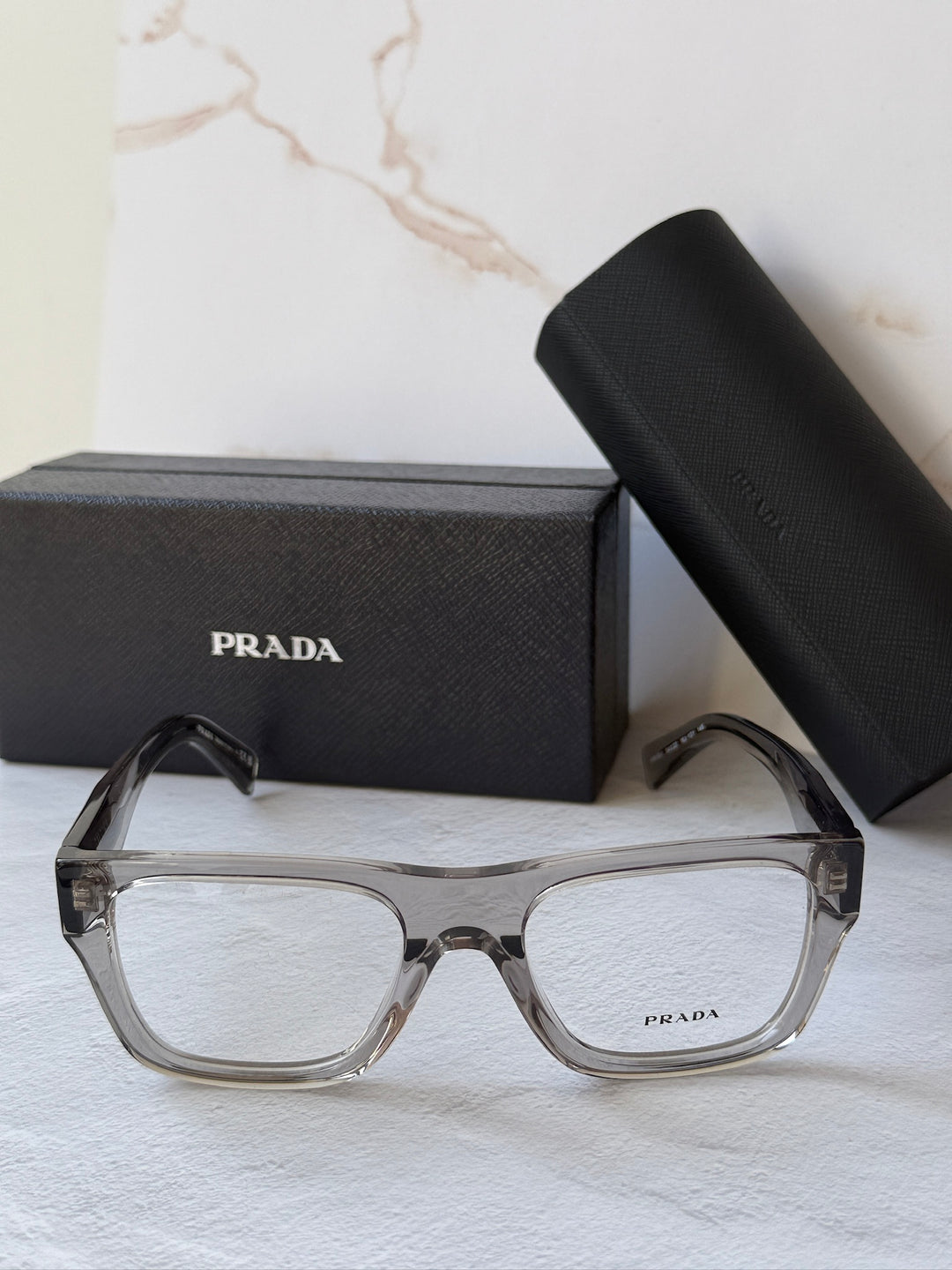 Prada PR C01V Square Eyeglasses Frames in Transparent Grey