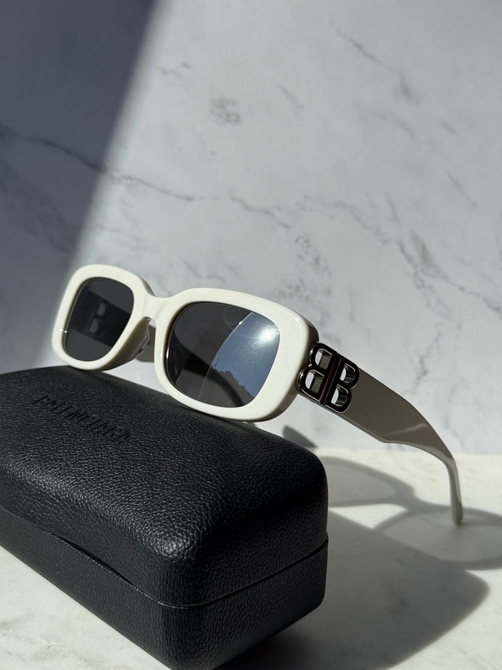 White square sunglasses with dark mirrored lenses and B logo temple detail