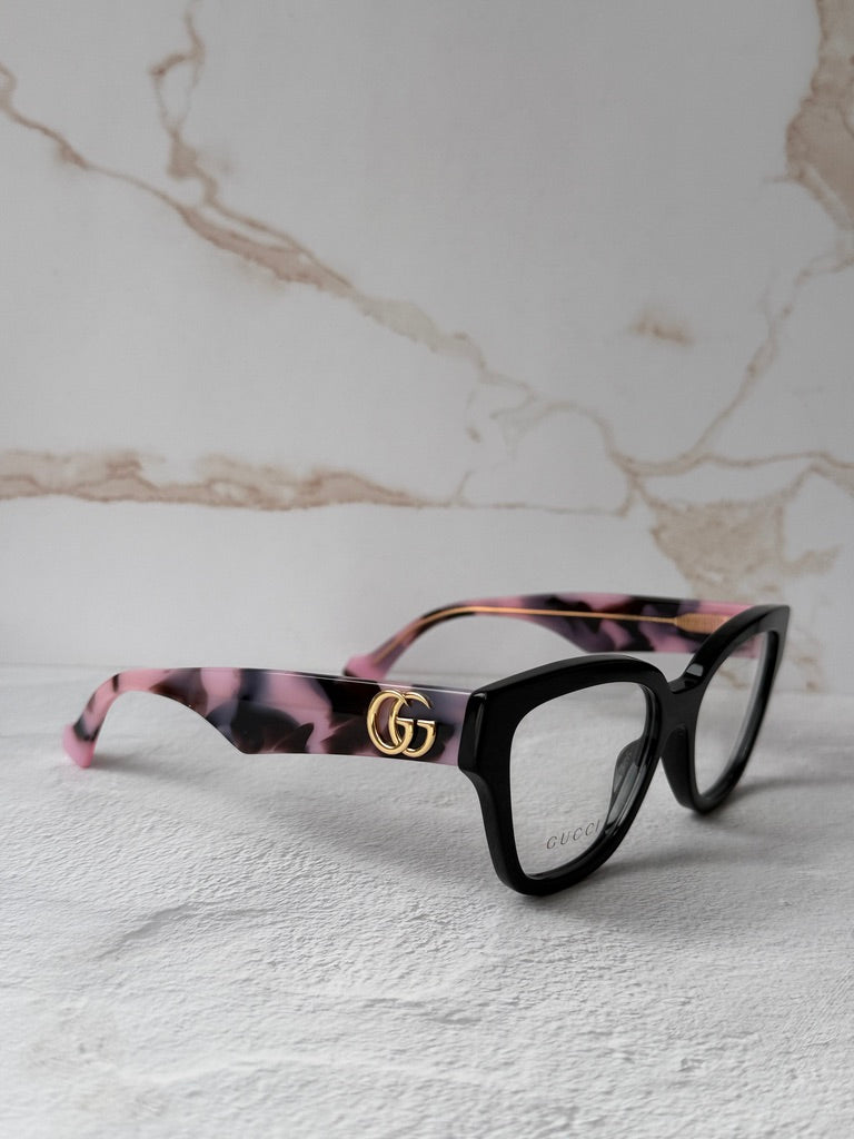 Monturas estilo ojo de gato Gucci GG1424O en negro 