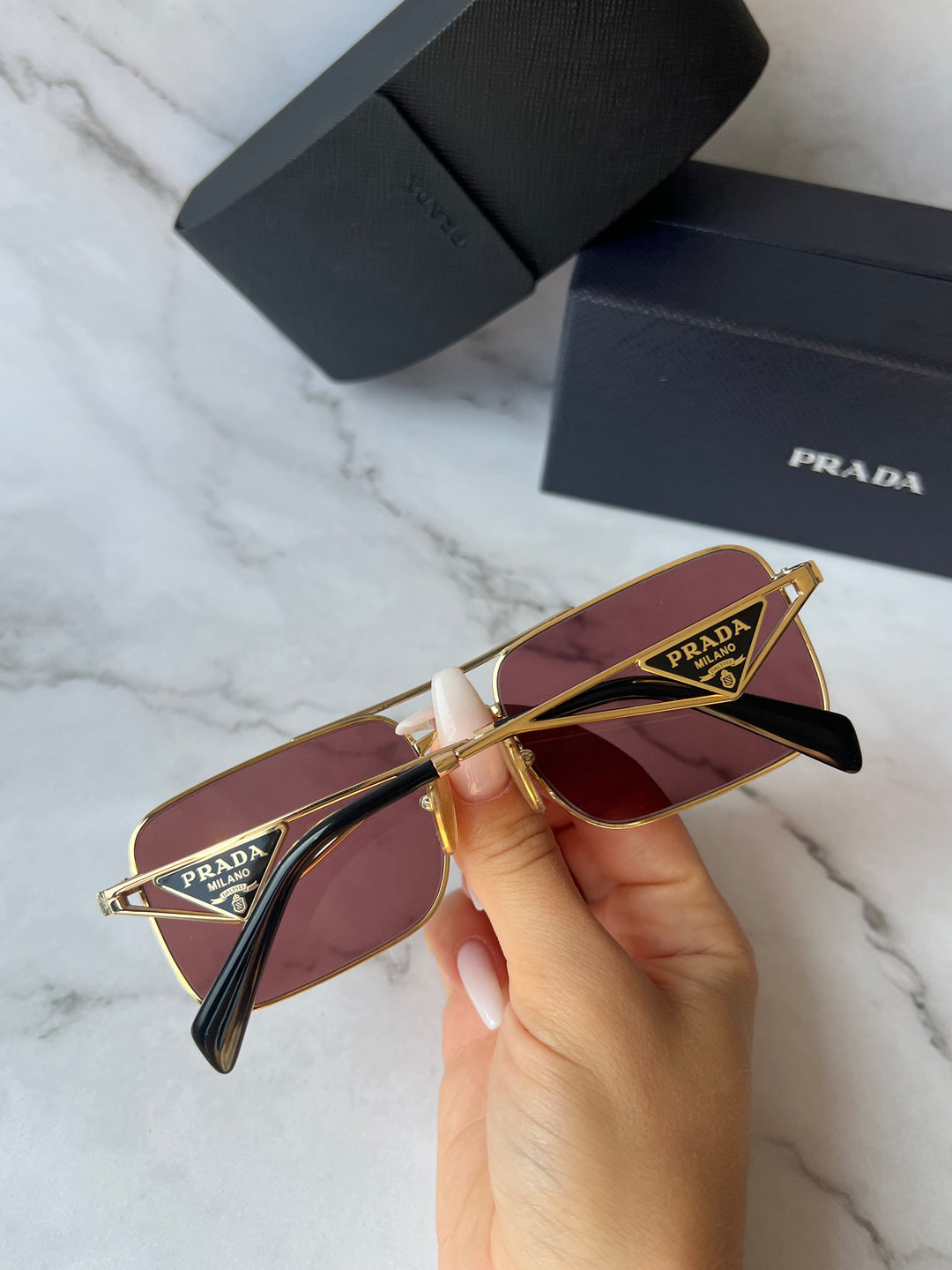 Prada PR A52S Sunglasses in Gold Violet