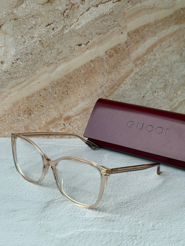 Monturas de anteojos estilo ojo de gato cuadrados desnudos Gucci GG0026O