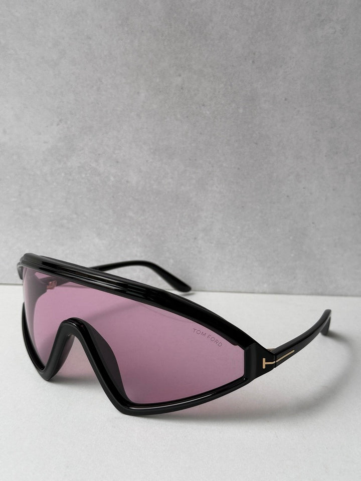 Black frame sunglasses with pink-tinted lenses