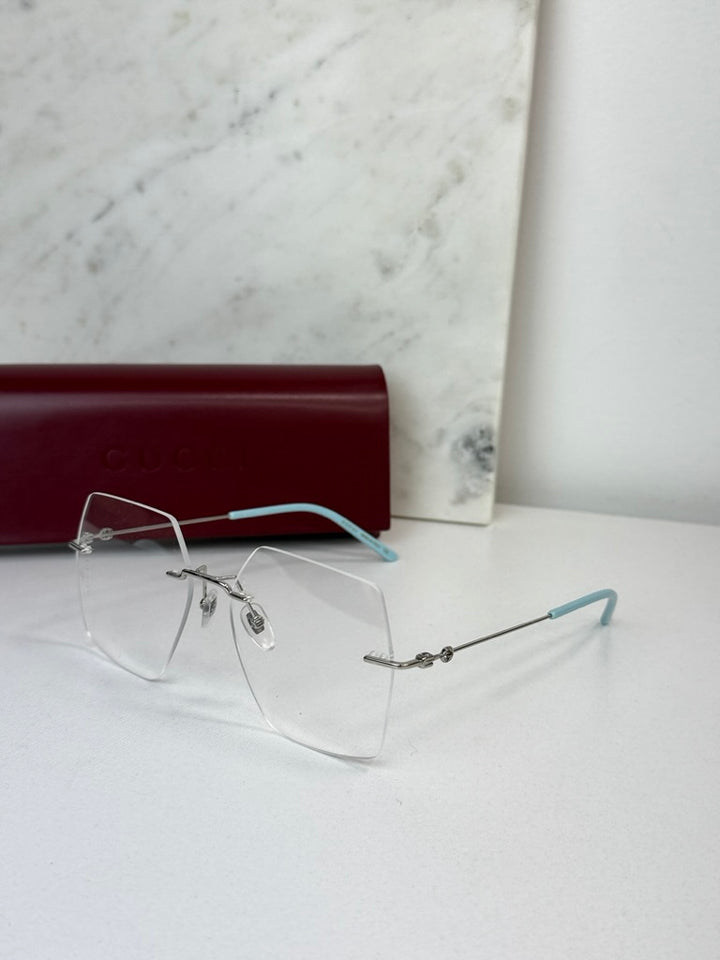 Monturas de anteojos sin montura hexagonales de gran tamaño Gucci GG0683O