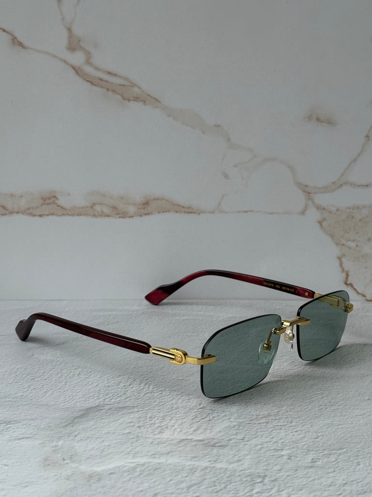 Gucci GG1221S Green Tinted Rimless Sunglasses