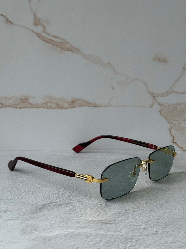 Gucci GG1221S Green Tinted Rimless Sunglasses