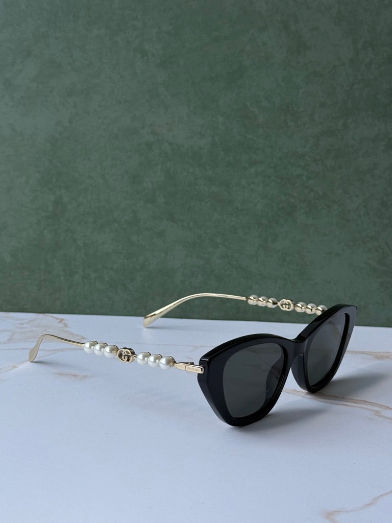 Gucci GG1257S Gafas de sol redondeadas con lentes marrones y rojos