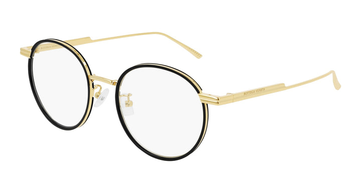 Black round eyeglass frames with gold temples and clear lenses