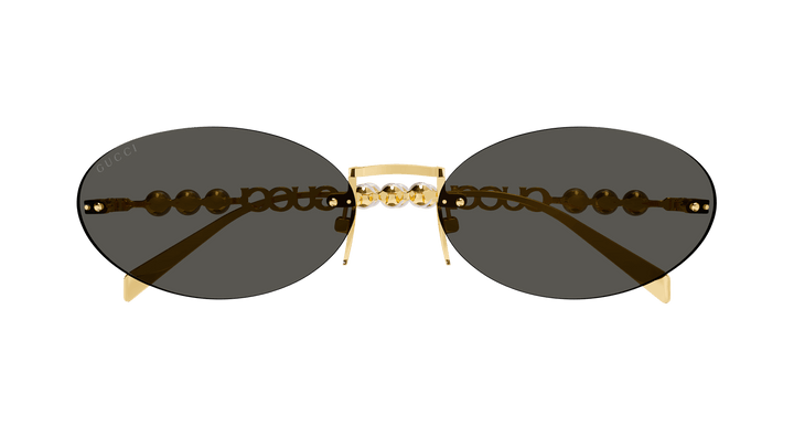 Gucci GG1257S Gafas de sol redondeadas con lentes marrones y rojos