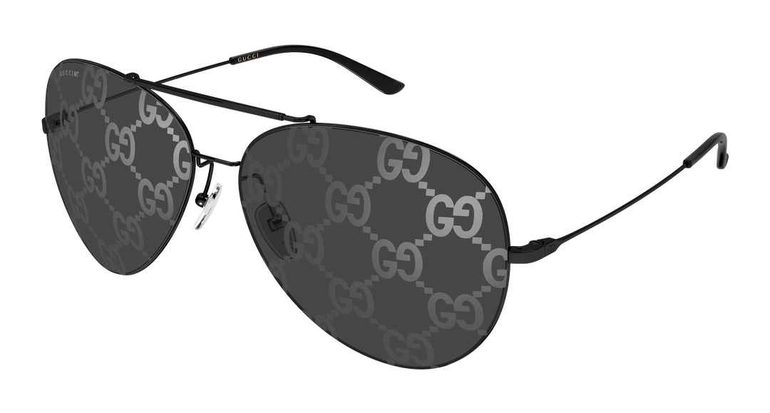 Aviator sunglasses with dark lenses and black GG logo patterned frame, metal bridge