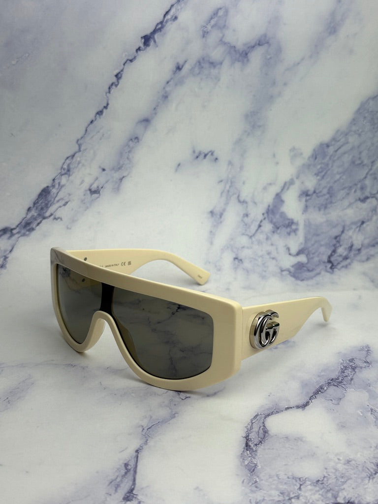 Gucci GG1257S Gafas de sol redondeadas con lentes marrones y rojos