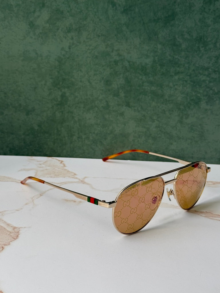 Gucci GG1220S Gafas de sol de aviador con monograma verde