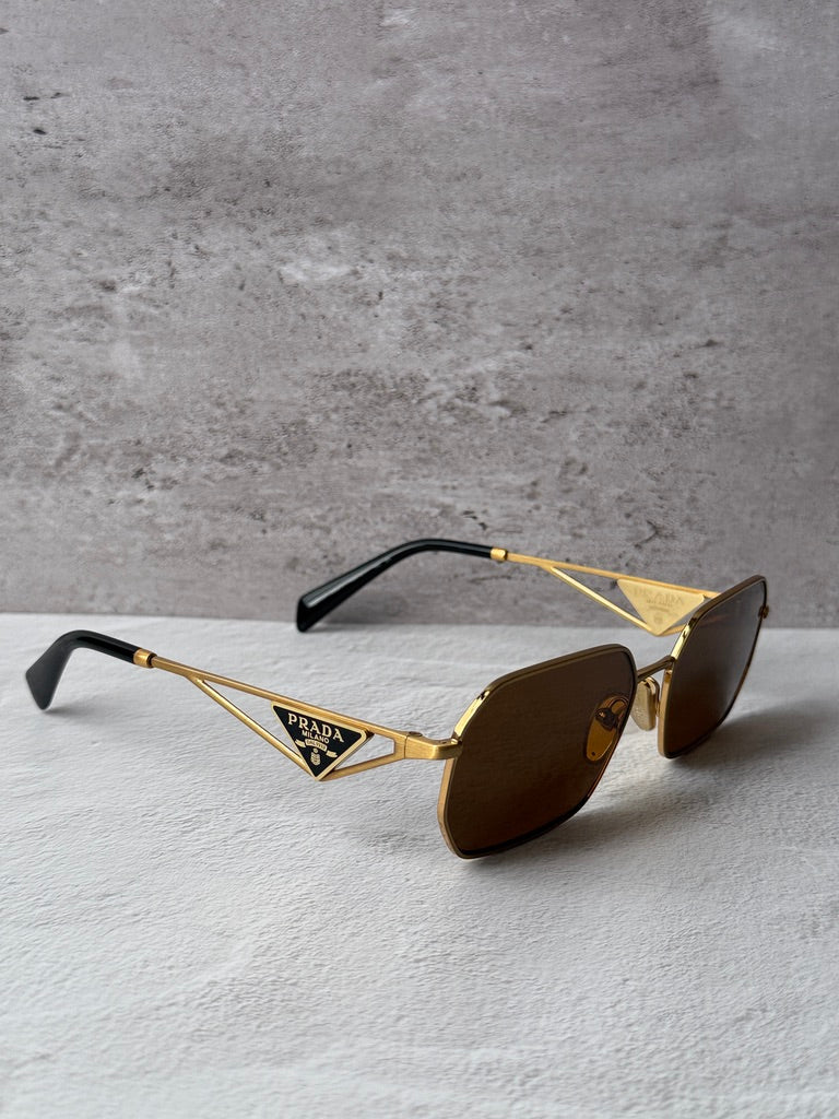 Gafas de sol Prada PR A51S en dorado rosa 