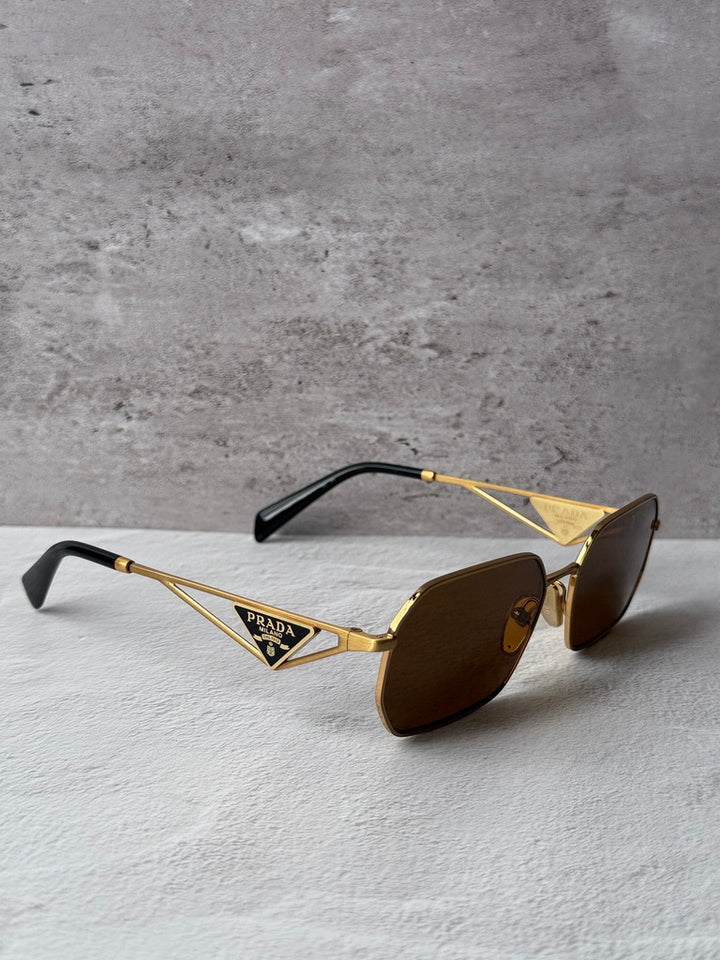 Gafas de sol Prada PR A51S en dorado rosa 