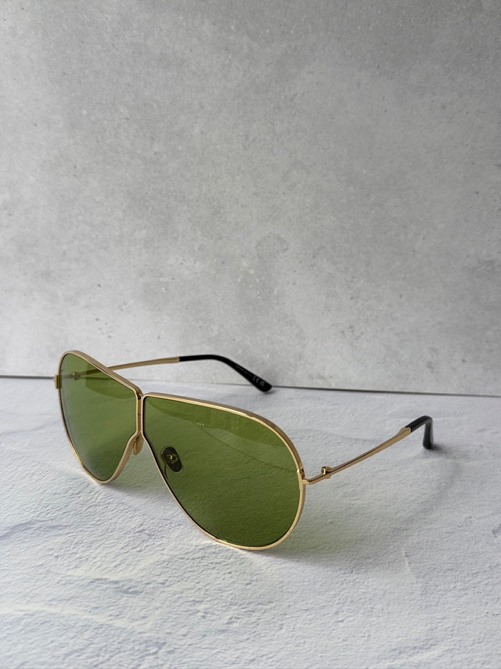 Keating aviator sunglasses with green lenses, gold-tone frame and black arms