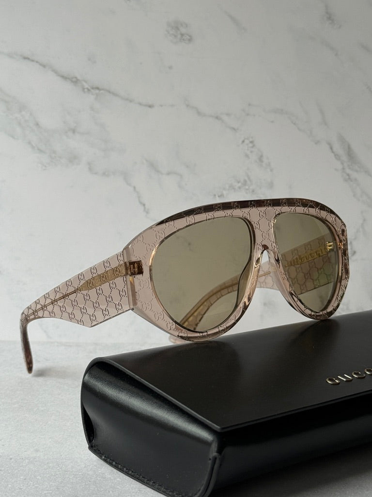 Beige GG-logo aviator sunglasses with smoky lenses and gold-tone details