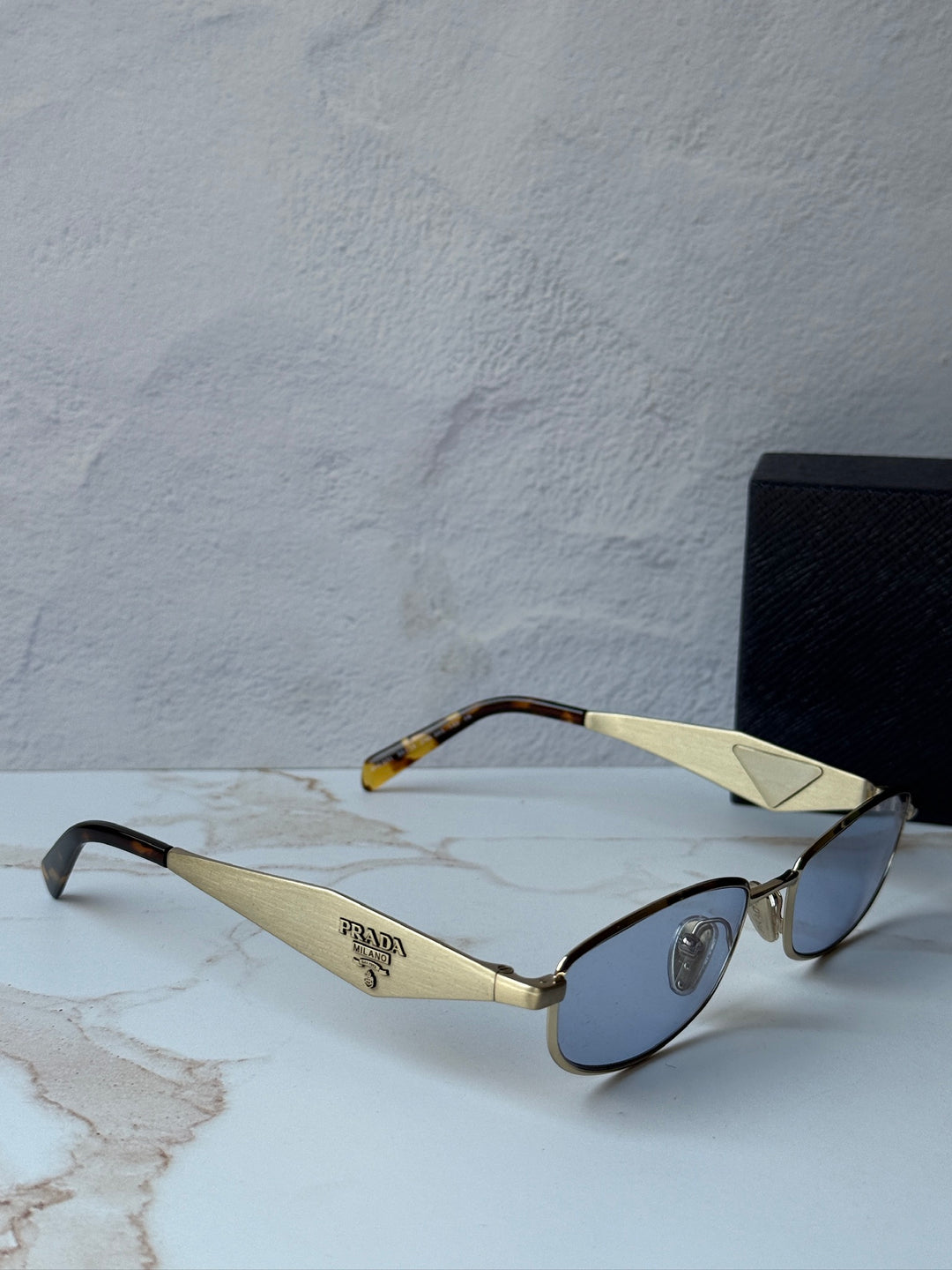 Prada PR D51S Metal Oval Sunglasses in Gold Blue