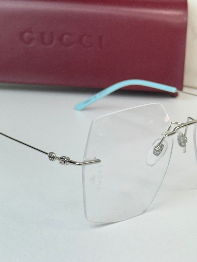 Monturas de anteojos sin montura hexagonales de gran tamaño Gucci GG0683O