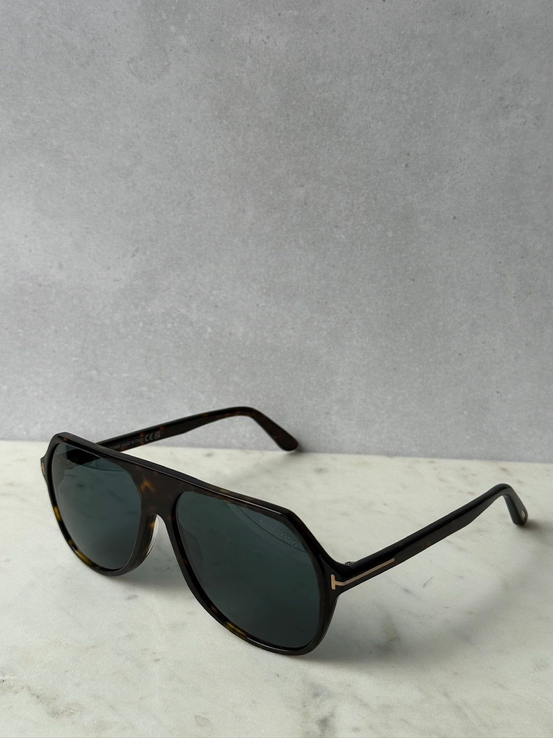 Aviator sunglasses, front view, dark Havana frame with green tinted lenses