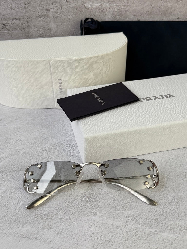 Prada PR C57S Rimless Sunglasses in Silver Grey