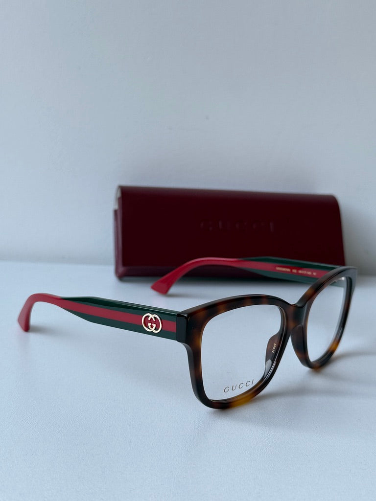 Monturas de anteojos Gucci GG0038ON con patas a rayas negras