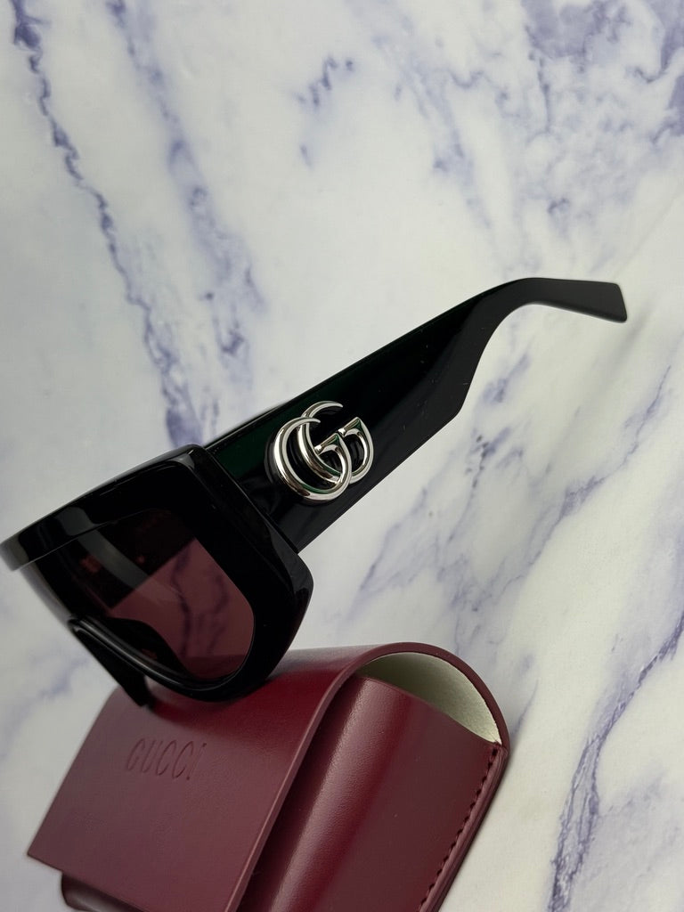 Gucci GG1257S Gafas de sol redondeadas con lentes marrones y rojos