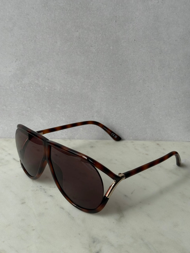 Aviator sunglasses side view with havana brown frame and dark tinted lenses