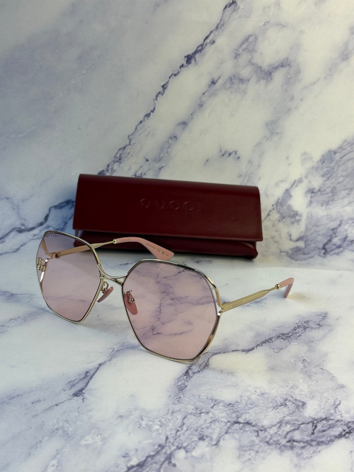 Gafas de sol con recorte de metal Gucci GG0818SA con lentes rosas