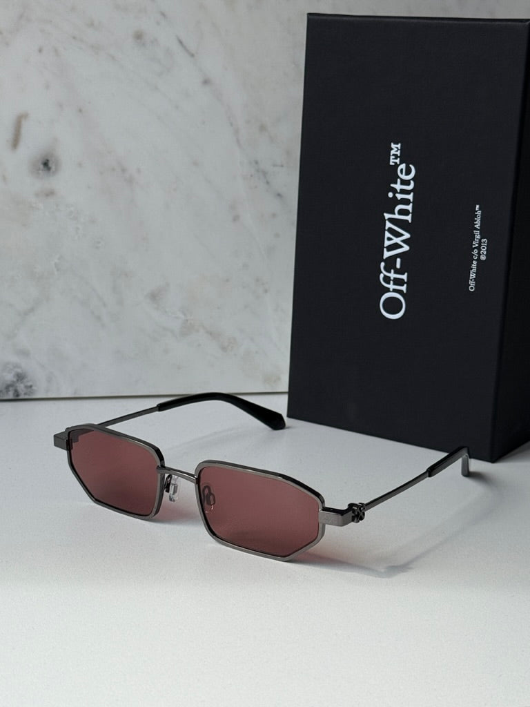 Loa sunglasses with burgundy lenses, gunmetal frame, and Off White presentation case