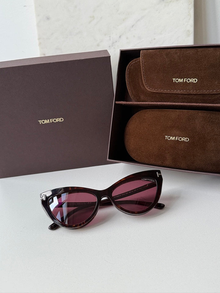 Tom Ford cat-eye sunglasses with havana-brown frames and dark pink-tinted lenses
