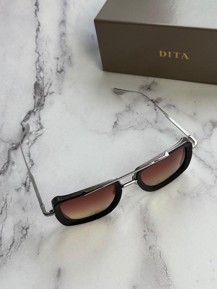 Aviator sunglasses side view with metal temple and rose-tinted lenses, black frame