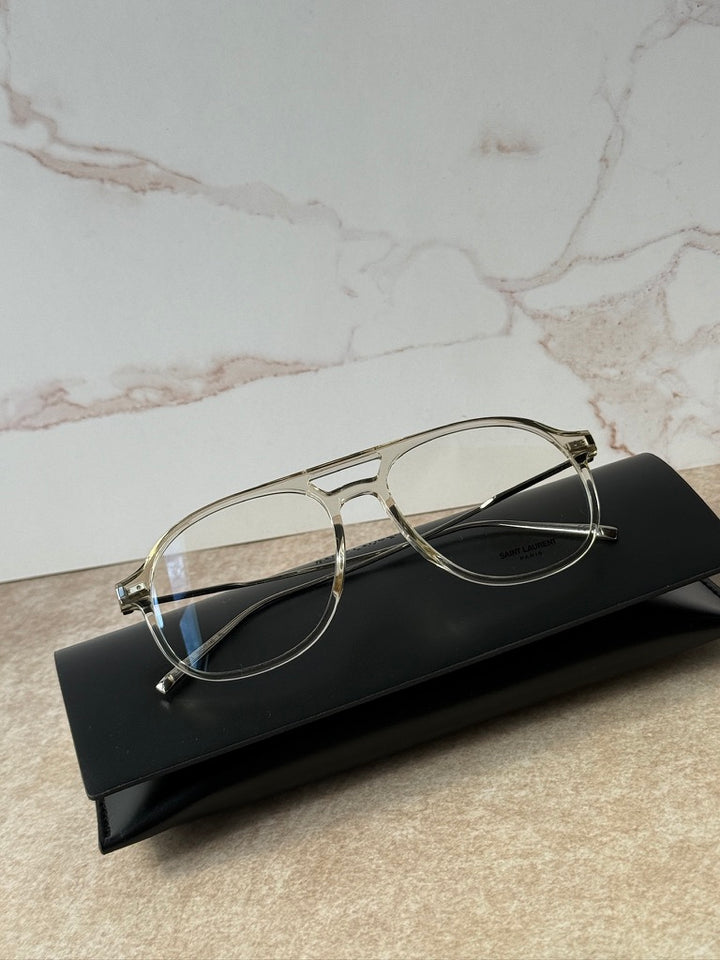Clear aviator eyeglass frames with round lenses and thin gold-tone metal arms