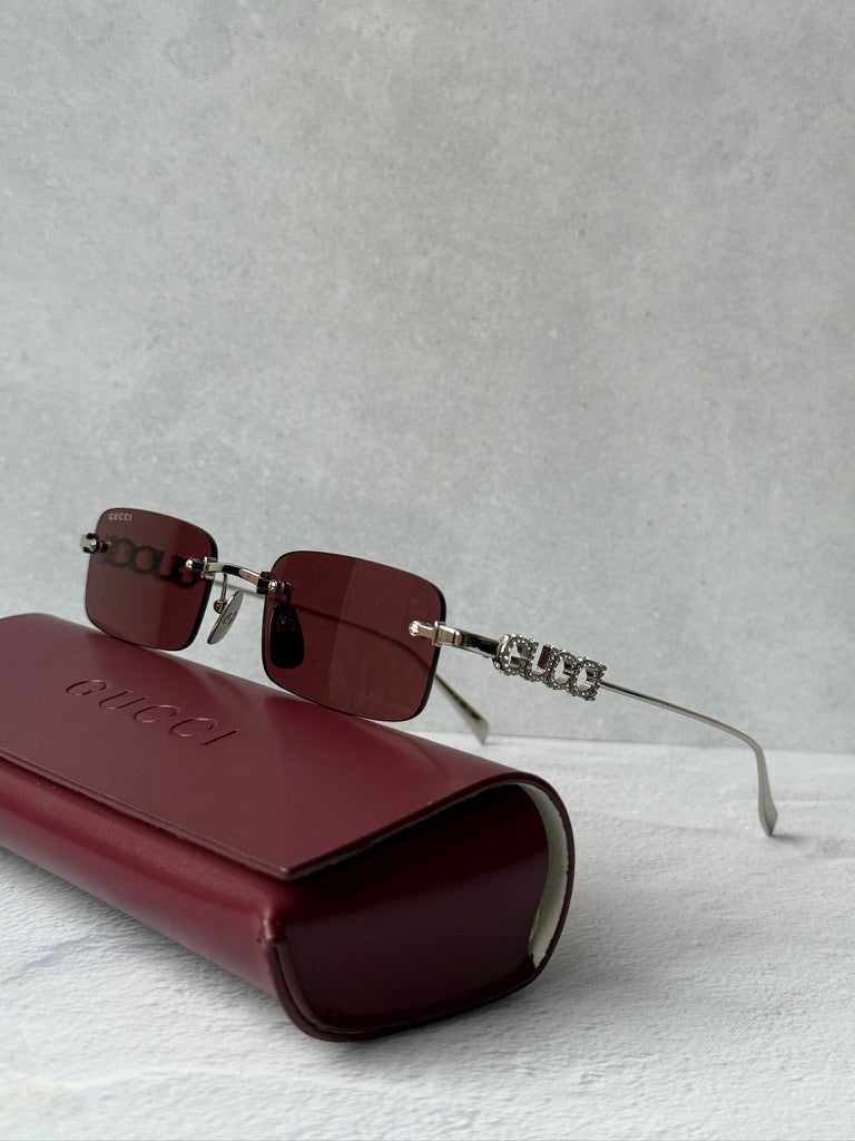 Gucci GG1808S Rimless Sunglasses in Silver Red Crystal