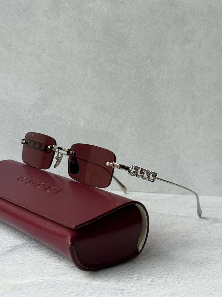 Gucci GG1808S Rimless Sunglasses in Silver Red Crystal