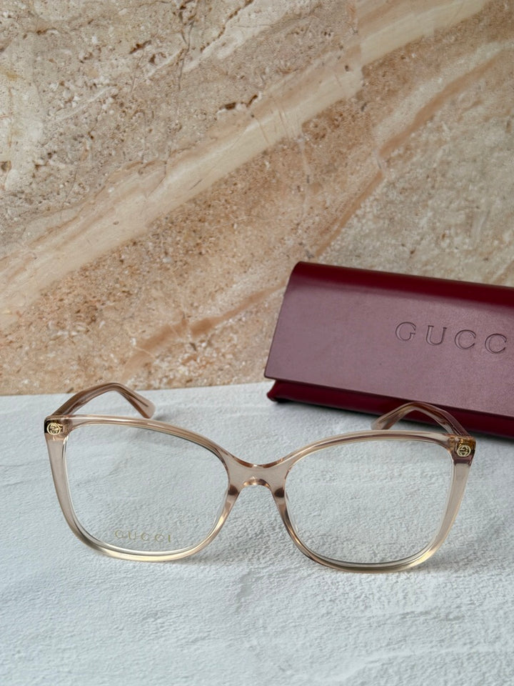 Monturas de anteojos estilo ojo de gato cuadrados desnudos Gucci GG0026O