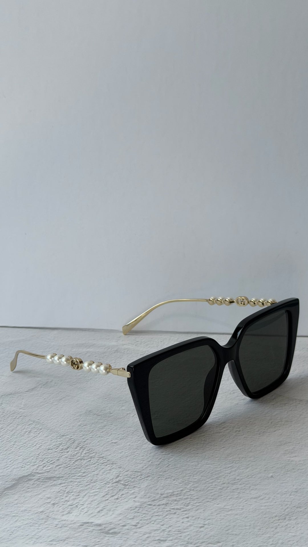Gucci GG1257S Gafas de sol redondeadas con lentes marrones y rojos