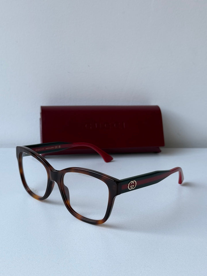 Monturas de anteojos Gucci GG0038ON con patas a rayas negras