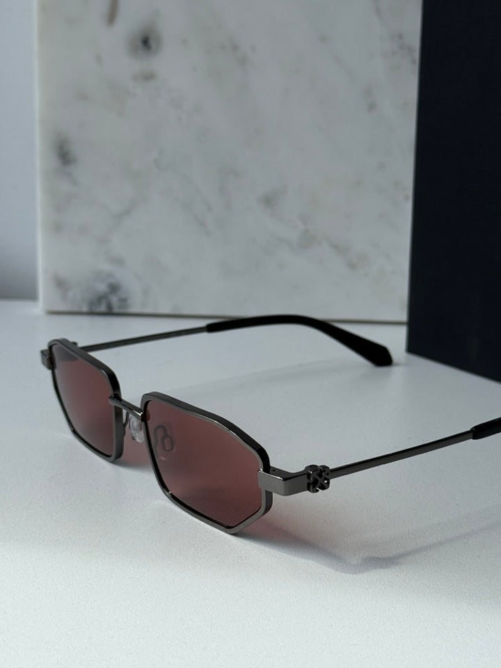Loa sunglasses, angled side view, burgundy lenses on gunmetal frame